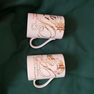 Two "Celebrate the Season" Mugs